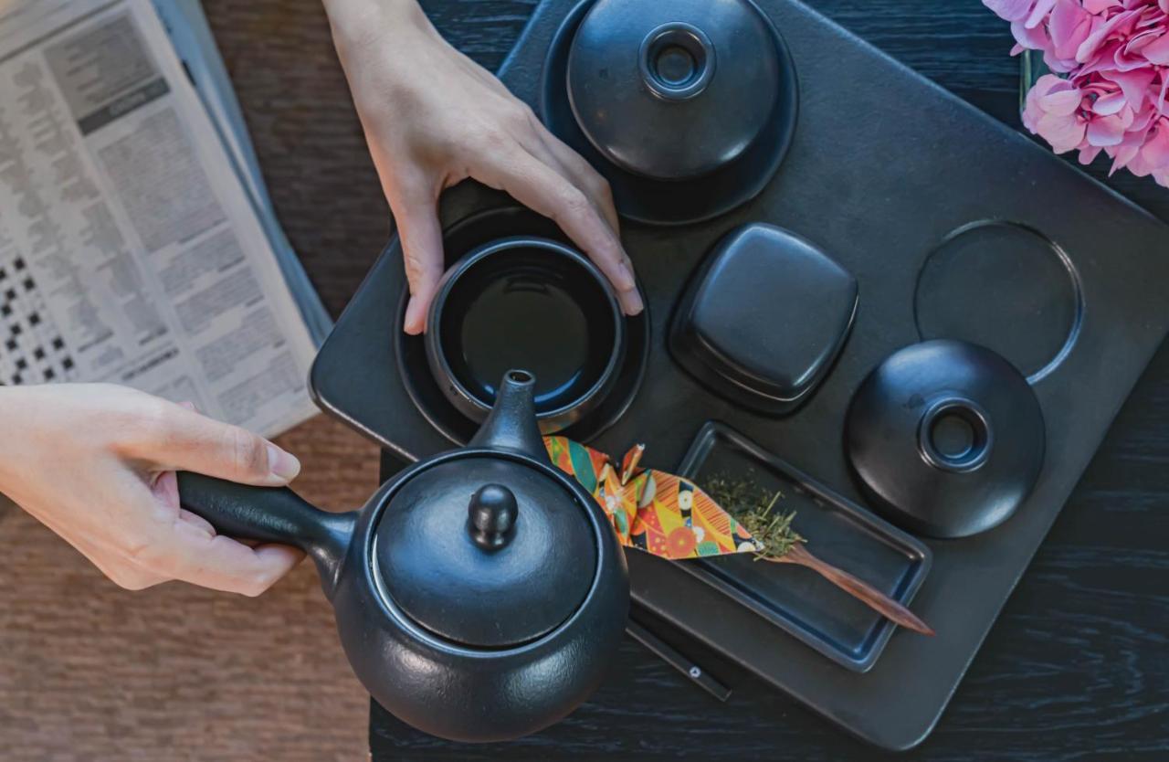 The Okura Prestige Bangkok Hotel Exterior photo A Japanese tea set