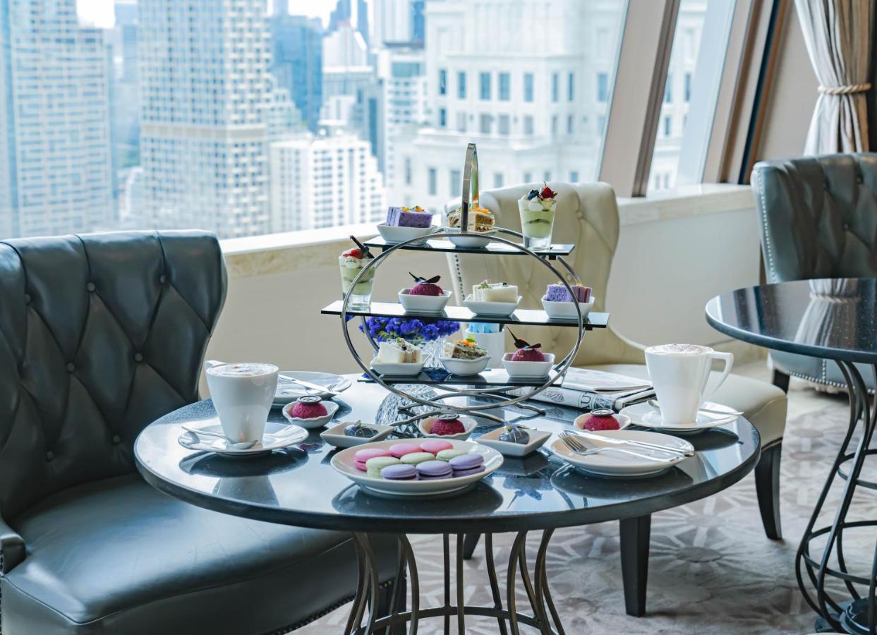 The Okura Prestige Bangkok Hotel Exterior photo Afternoon tea at the 87th floor of the hotel