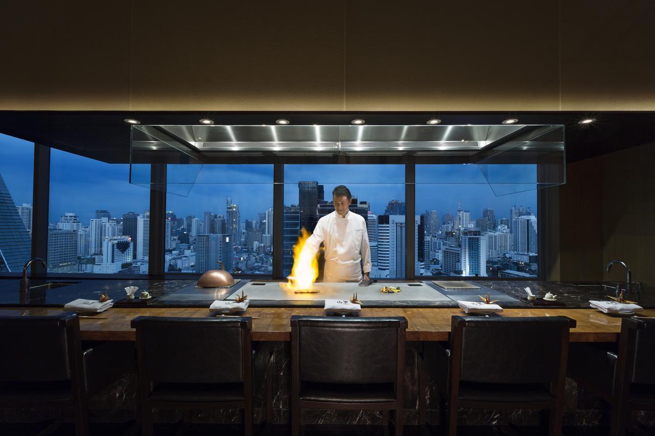 The Okura Prestige Bangkok Hotel Exterior photo Chef at work at the restaurant